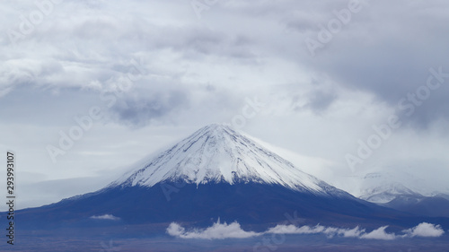 View of the Licancabur volcano covered by clouds, Atacama Desert, Chile