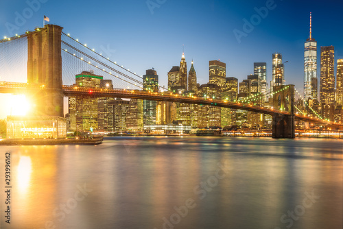 a magnificent view of the lower Manhattan and Brooklyn Bridge with sunset  New York City