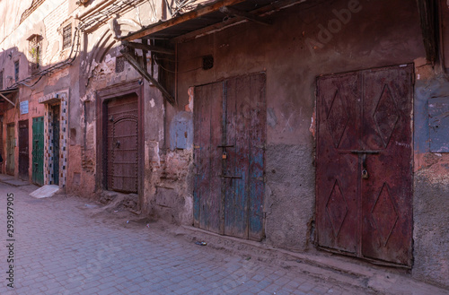 Small street in Marrakech s medina old town. In Marrakech the houses are traditionally pink. Morocco