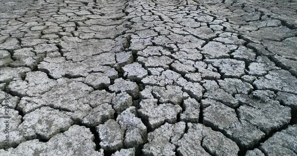 Dry lake bed with natural texture of cracked clay in perspective floor Dry lake bed with natural texture of cracked clay in perspective floor