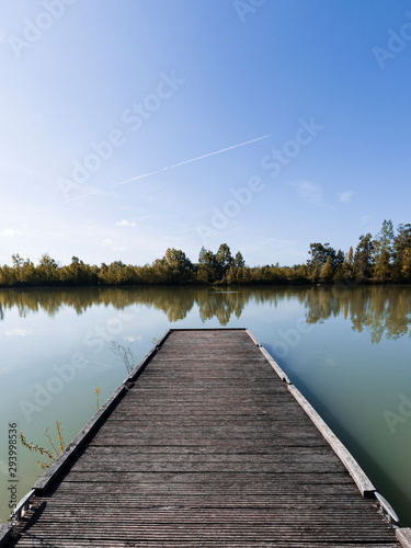bridge on a lake one autumn morning