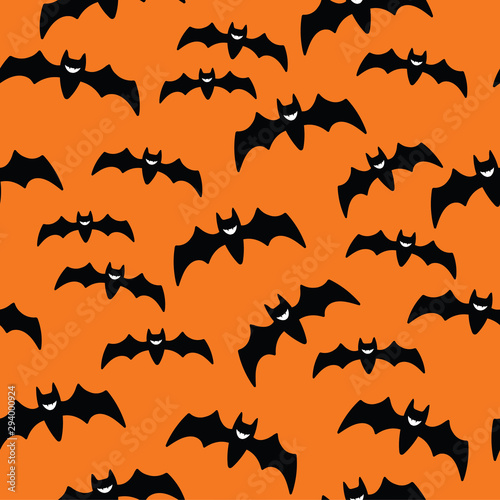 Halloween Seamless Pattern with Flying Black Bat vampire Silhouettes on Orange Background. Vector Illustration