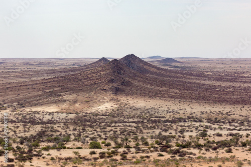 Barren landscape with some mountains in the nature reserve of Spitzkoppe, Erongo, Namibia, Africa