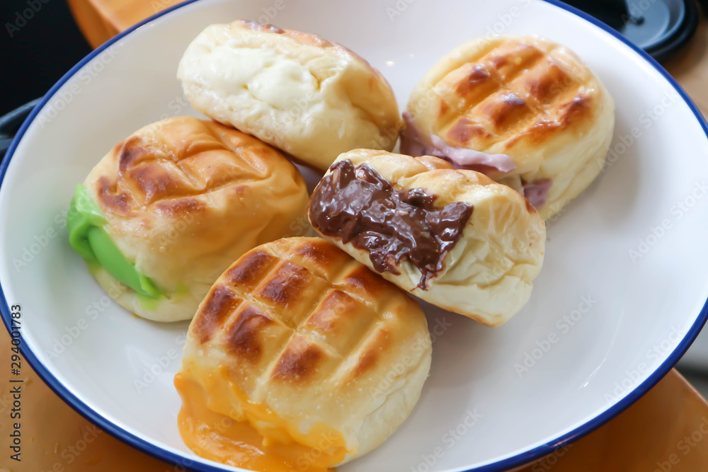 bun or bread with chocolate stuffed and green tea stuffed bun or bread with chocolate stuffed and green tea stuffed
