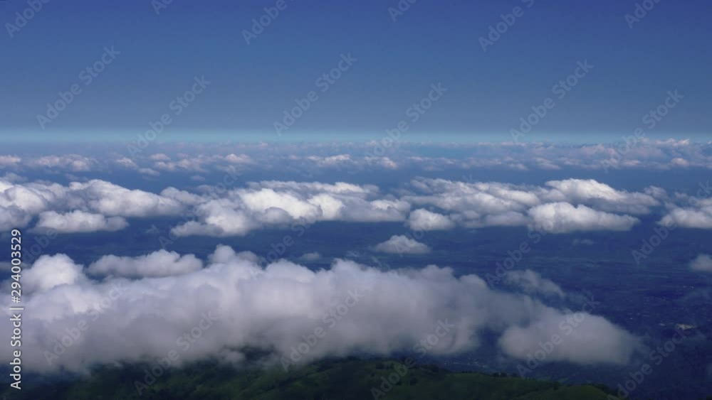 Moving clouds, view from the top of the mountain Moving clouds, view from the top of the mountain