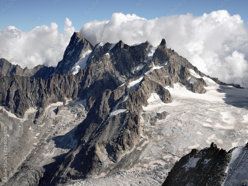 Obraz premium Grandes Jorasses 4,208 m (13,806 ft) and Dent du Geant mountain, Haute-Savoie, France. Late summer landscape of high alpine Mont Blanc massif with glaciers.