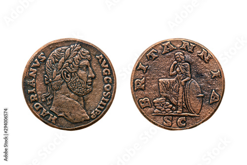 Roman Sestertius Replica Coin of  Roman Emperor Hadrian 117-138 AD obverse and reverse sides cut out and isolated on a white background photo