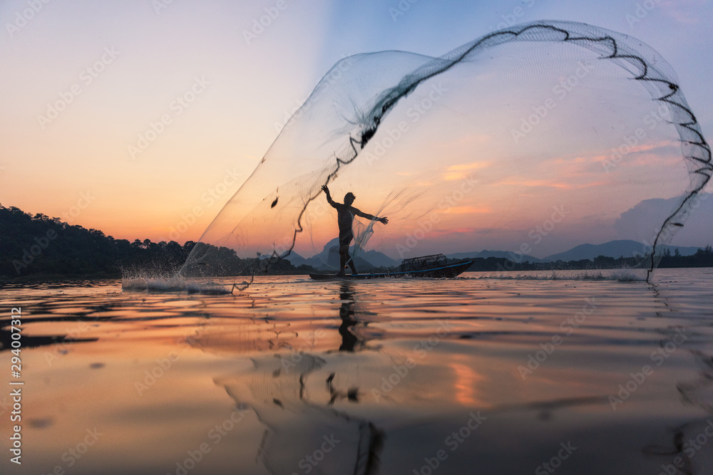 Asian Fishermen Throwing Fishing Net During Twilight On Wooden Boat At The  Lake Concept Fishermans Lifestyle In Countryside Lopburi Thailand Asia  Stock Photo - Download Image Now - iStock, fishnet fishing