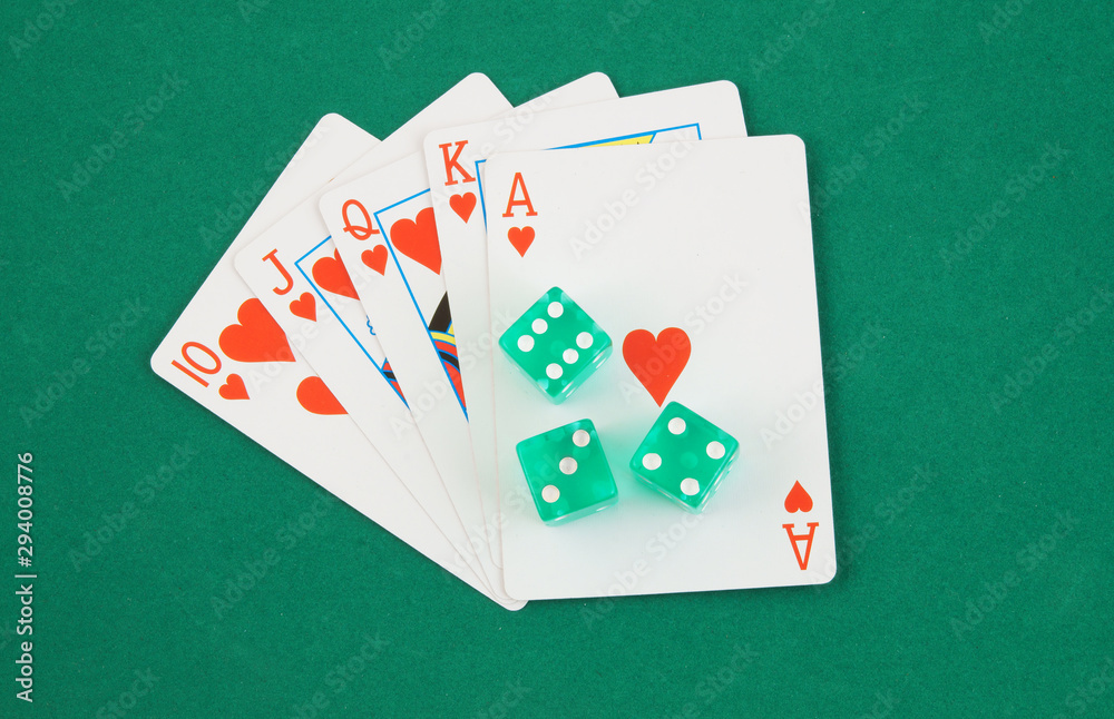 Fototapeta premium Dices and cards on green table, gambling concept