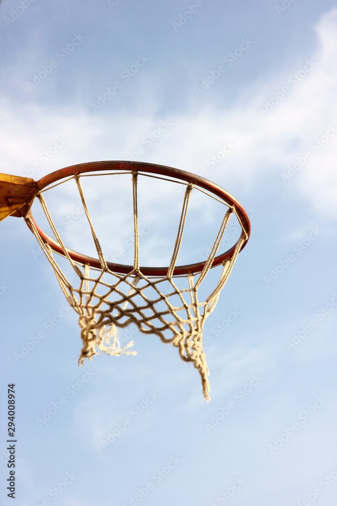 view of the basketball basket against the sky