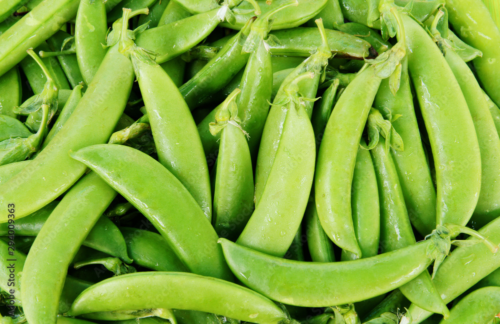 Fresh green peas pods background Fresh green peas pods background