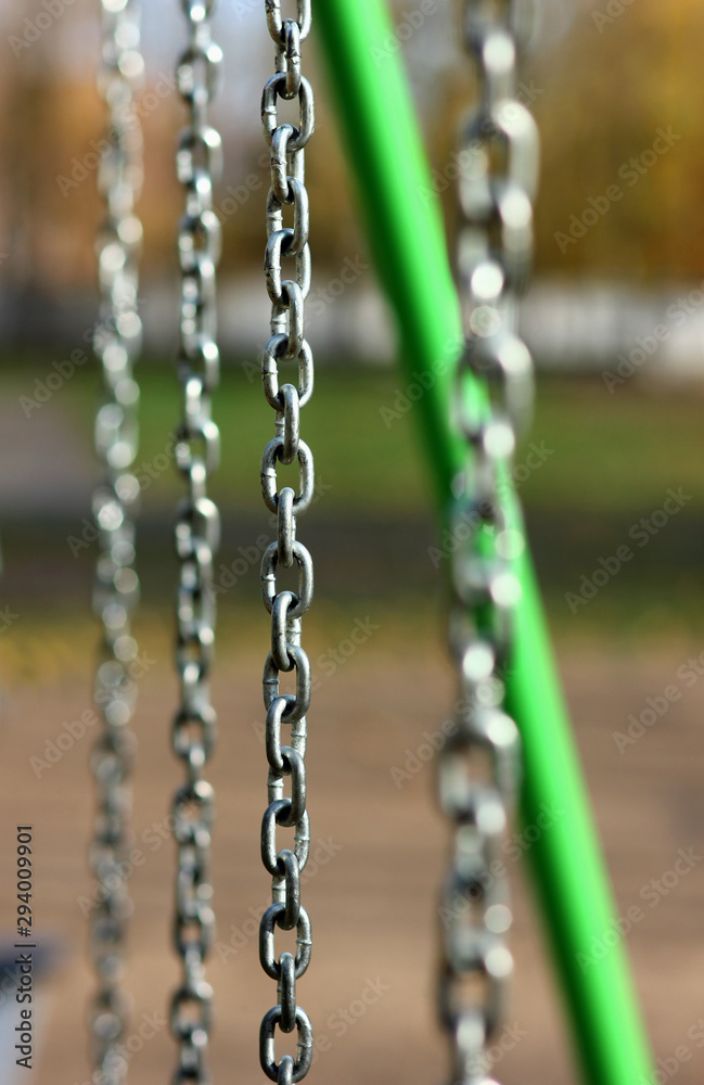 metal chains on the playground closeup