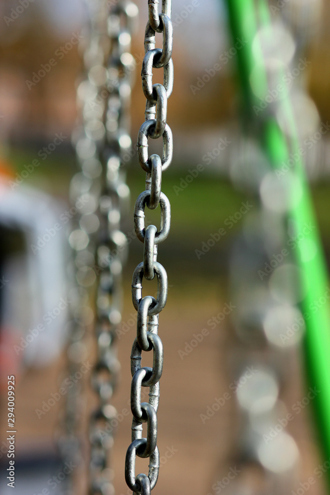 metal chains on the playground closeup metal chains on the playground closeup