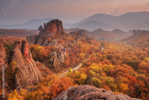 Fototapeta Naklejka Na Ścianę i Meble -  Belogradchik rocks. Magnificent panoramic sunset view of the Belogradchik rocks in Bulgaria. Autumn scene.