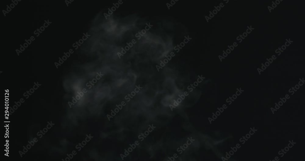 Slow motion water mist puff stream over black background Slow motion water mist puff stream over black background