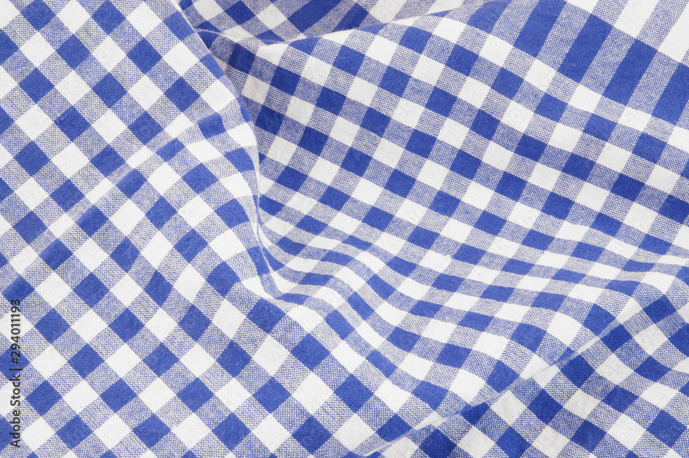Blue and white checked tablecloth background Blue and white checked tablecloth background