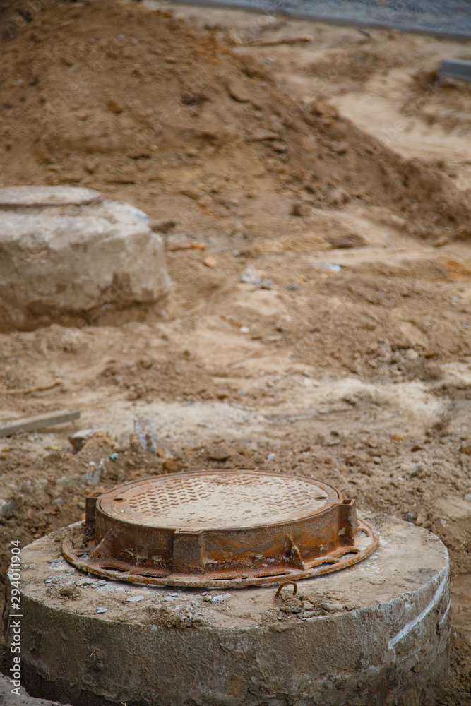 construction site, installation of manhole