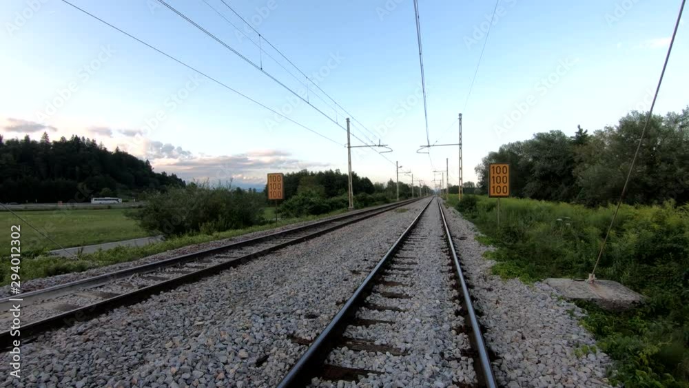 4K Left side moving double railway near Ljubljana, Slovenia 4K Left side moving double railway near Ljubljana, Slovenia