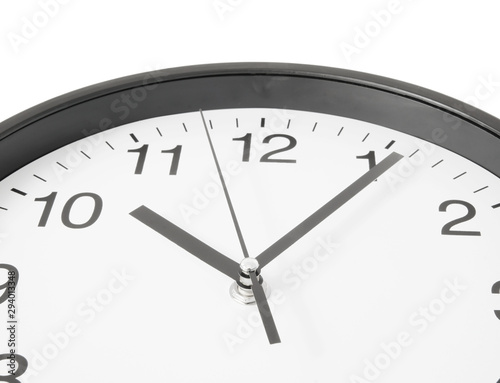 Round clock close up isolated on white background
