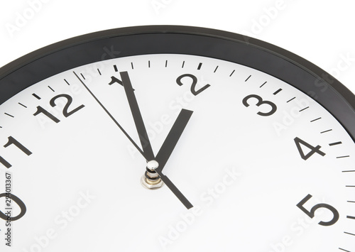 Round clock close up isolated on white background
