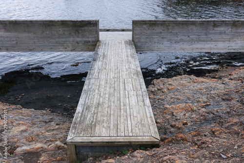 Public dock on the beach photo