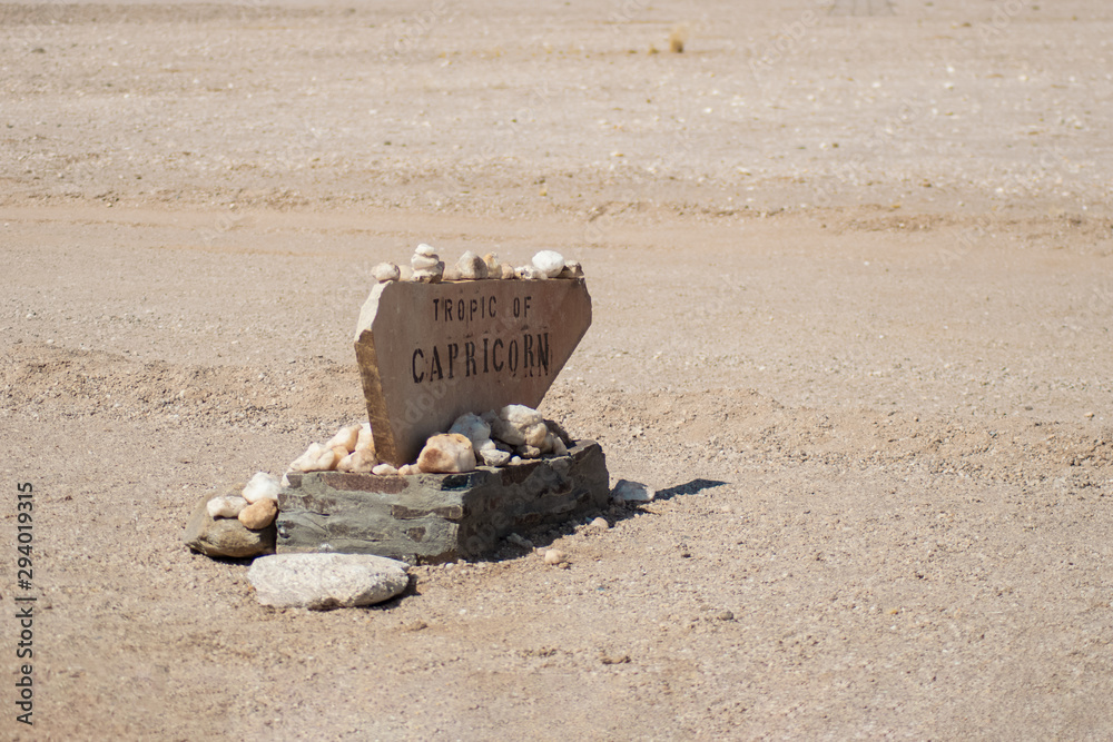 Tropic of Capricorn milestone in Namibia desert Africa Stock Photo