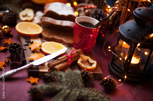 christmas hot mulled wine with cinnamon cardamom and anise on wooden background