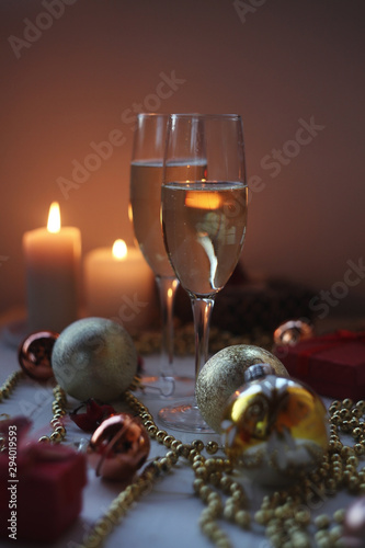 new years eve party table with champagne ,candles,tree decorations