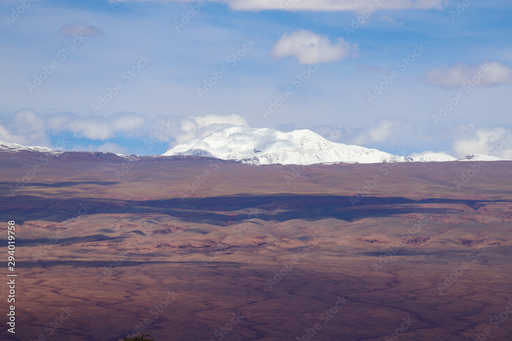 View of the Andean volcanoes covered by snow, Atacama Desert, Chile