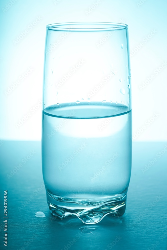 Glass half empty or glass half full. Psychology or motivational concept Glass half empty or glass half full. Psychology or motivational concept