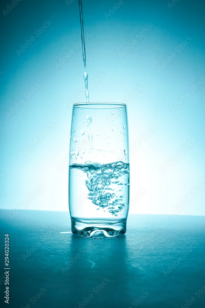 Glass half empty or glass half full. Psychology or motivational concept Glass half empty or glass half full. Psychology or motivational concept