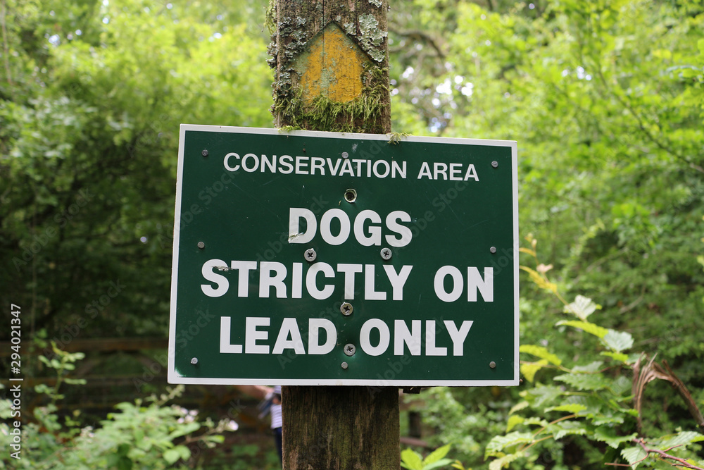 A Sign in a Conservation Area, Warning Dogs on Leads Only 