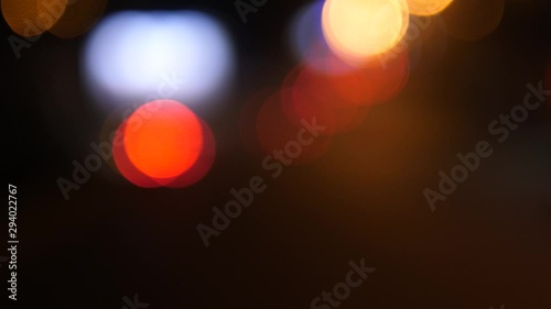 Blurred night traffic lights with street noise