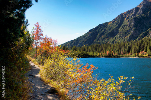 Beautiful autumn tourist path at Poprad lake in Hight Tatras mountain in Slovakia