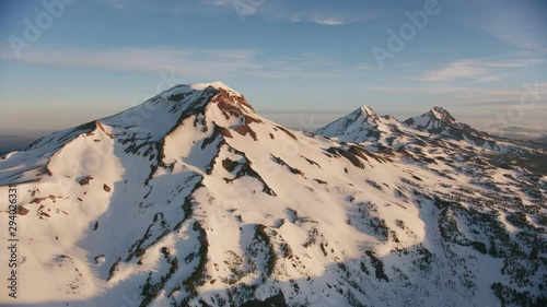 Cascade Mountains, Oregon circa-2019.  Aerial view of Sisters Mountains.  Shot from helicopter with Cineflex gimbal and RED 8K camera.
