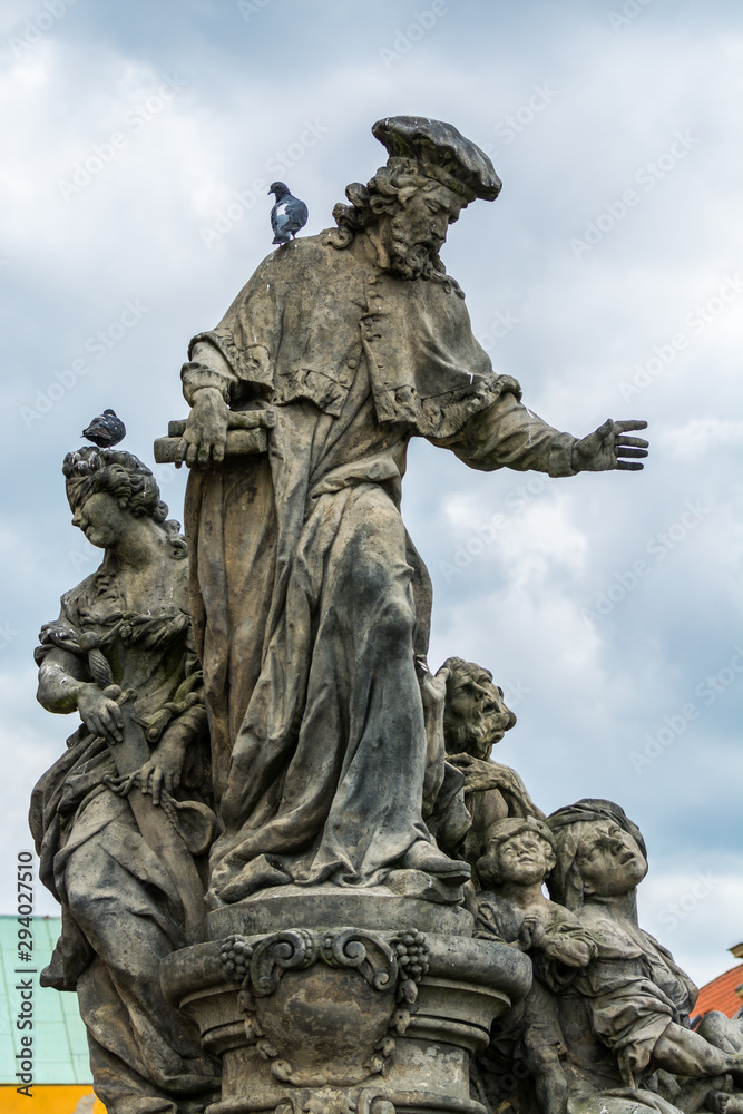 Statue of St. Ivo at the Charles bridge, Prague, Czech, The statue depicts the patron saint of lawyers who are accompanied by Justice.