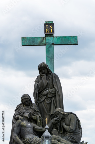 The statue of Pieta  Lamentation of Christ on Charles Bridge    is an outdoor sculpture by Emanuel Max  installed on the south side of the Charles Bridge in Prague  Czech Republic. 