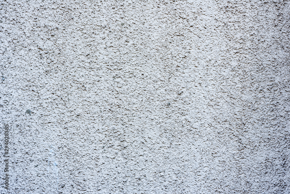 Obraz premium Texture of a concrete wall with cracks and scratches which can be used as a background