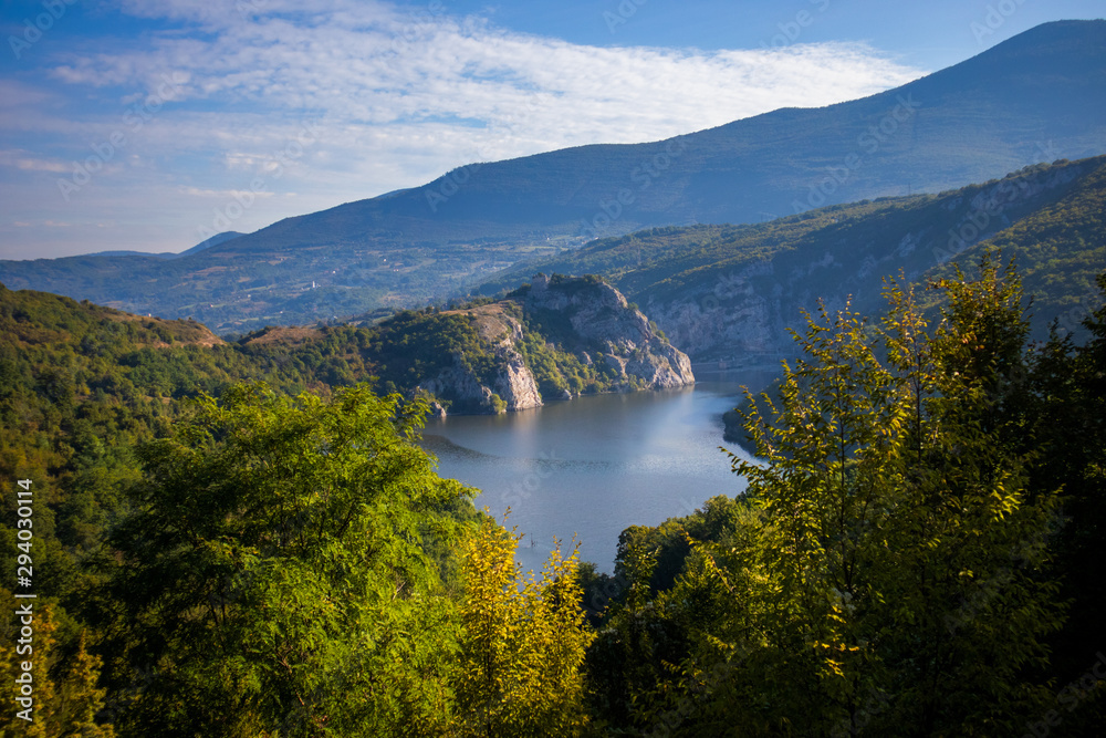 River surrounded by the hills and mountains. Vrbas river in Bosnia and Herzegovina.