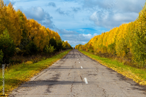 the road in the Russian Outback the road in the Russian Outback Golden autumn, filmed on a cloudy day in Chuvashia photo