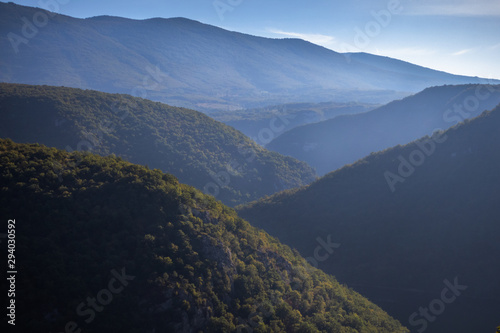 River surrounded by the hills and mountains. Vrbas river in Bosnia and Herzegovina.