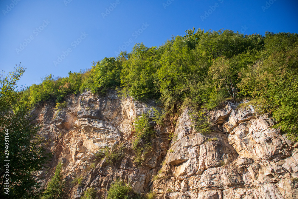 River surrounded by the hills and mountains. Vrbas river in Bosnia and Herzegovina.