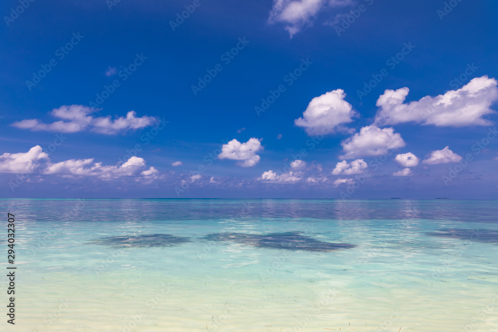 Clear aqua blue sea water and white sand beach. Exotic sea view