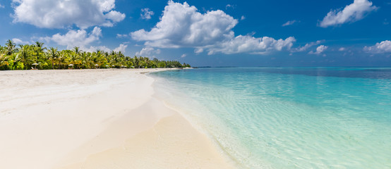 Luxury beach resort with palms on white sand, topical island background, summer vacation concept, holiday and tourism design. Exotic landscape, inspirational leisure banner