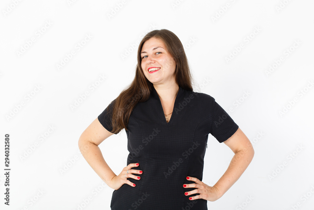 young not thin girl in a black dress. ?hubby young woman. White background. Red lips. Studio photo. Happy elegant lady. Love of herself. Love yourself. Diet, weight loss young not thin girl in a black dress. ?hubby young woman. White background. Red lips. Studio photo. Happy elegant lady. Love of herself. Love yourself. Diet, weight loss