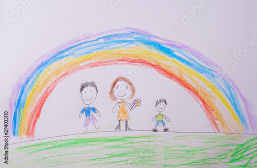 Child's Drawing of happy family under the rainbow. What a children's picture can tell.