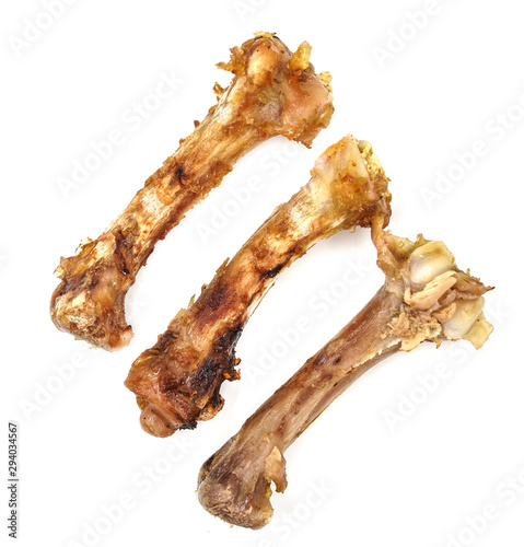 Small bones on a white background. food scraps. chicken bones