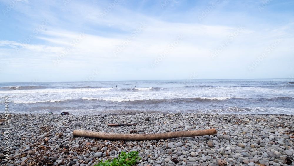 Ocean and stone beach at El Tunco in El Salvador 