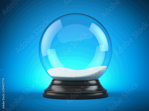 Empty snow globe - Christmas magic ball on blue background. photo