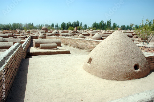 Old traditional uyghur cemetery. Kashgar, Xinjiang, China. photo